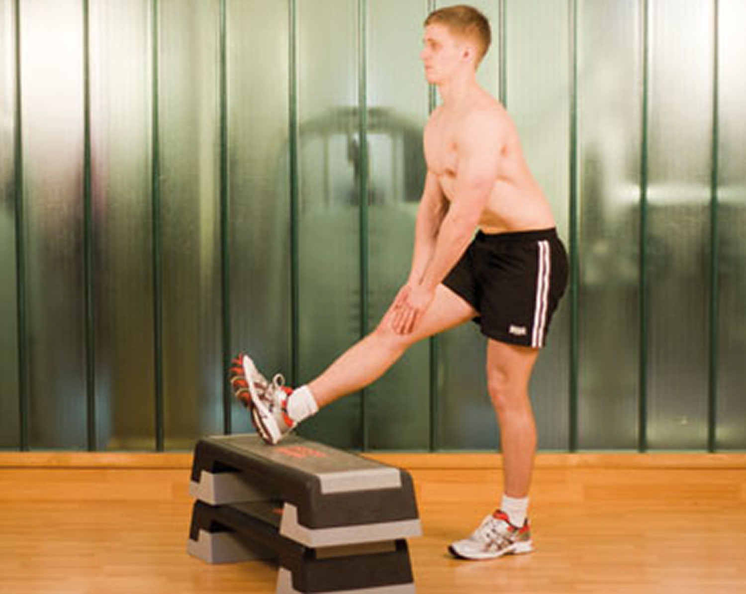 Standing hamstring stretch for pinched sciatic nerve